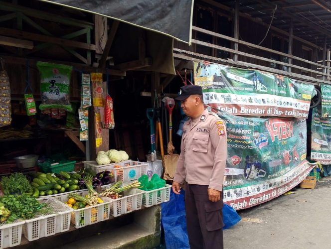 
					Giat Piket polsek Kapuas Tengah Patroli ke pasar harian Pujon desa Pujon.