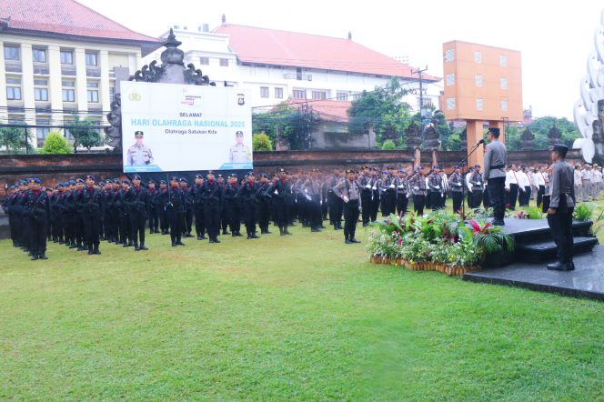 
					Meski Diguyur Hujan, Polda Bali Tetap Gelar Upacara Peringatan Haornas Ke-42