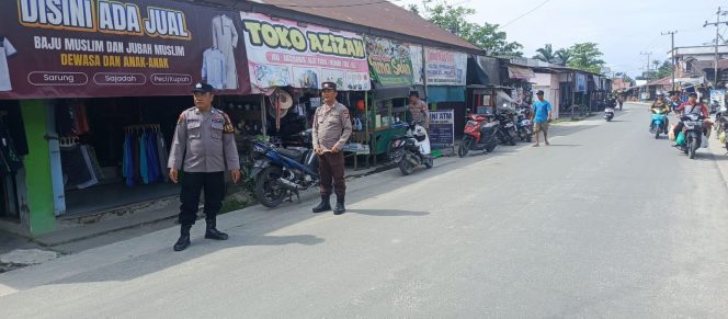 
					Personil polsek lakukan Patroli ke pasar harian Pujon desa Pujon.