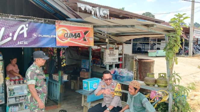 
					Tangkal Isu Hoaks, Personel Polsek Manuhing Edukasi Warga Tumbang Talaken Lewat Dialog