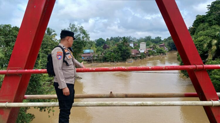 Polsek Manuhing Gencarkan Patroli, Pastikan Wilayah Rawan Genangan Air Terpantau